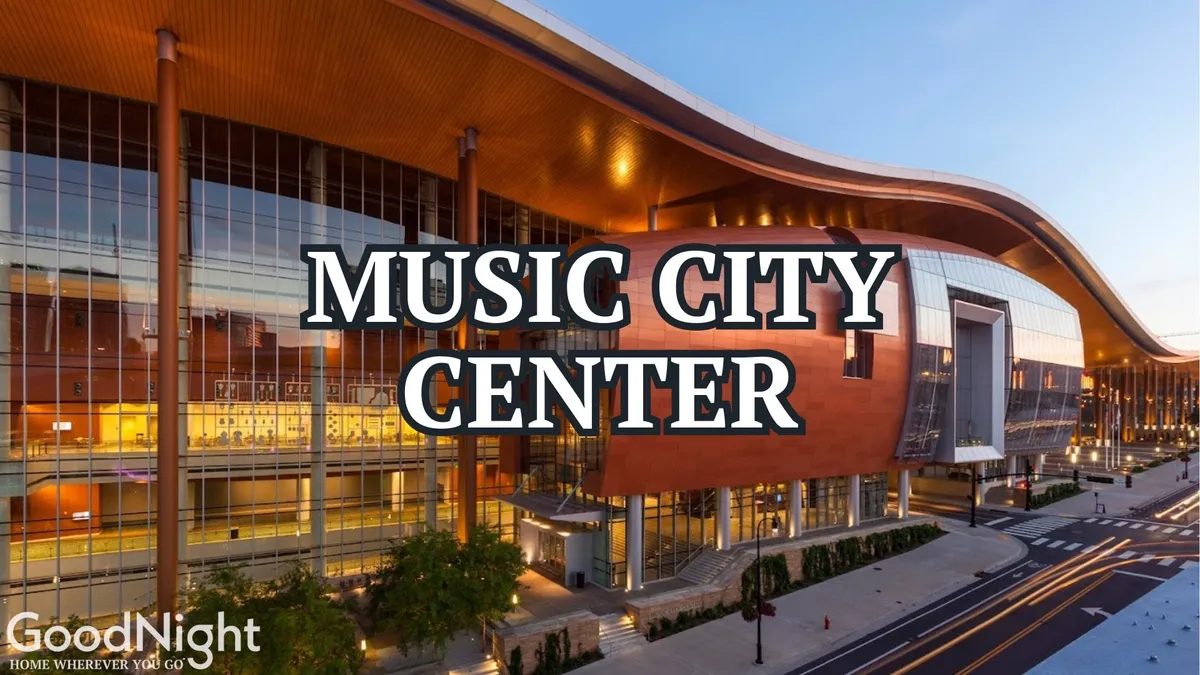 A modern building with large glass windows and a distinctive curved roof, bustling with activity as people attend concerts, exhibitions, and community events.